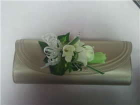 rose, lizzianthus and freesia bag corsage.